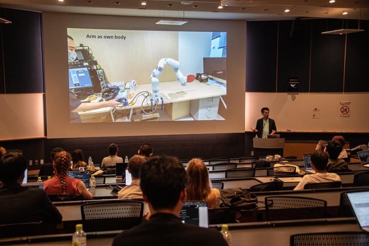 Dr. Shunichi Kasahara presented his research on human-machine integrated systems 