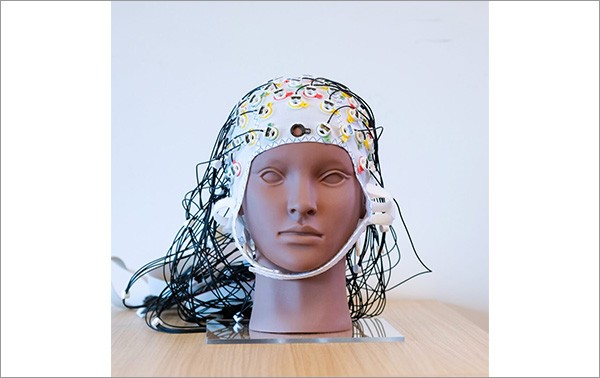 manequin head covered with wires