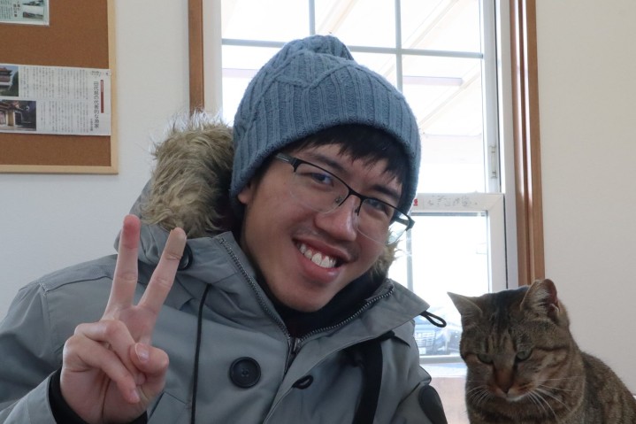 portrait of Chen Lam LOH with a cat