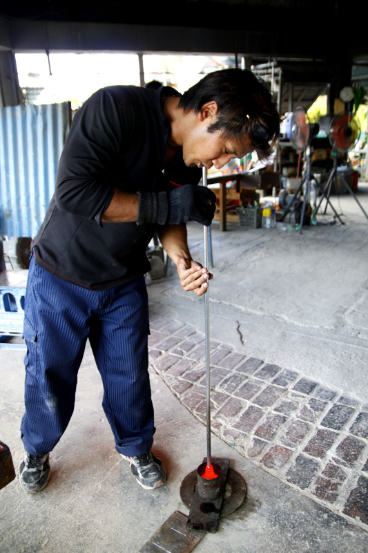 One of Mr. Inanime's assistants at the artist's studio, Mid-air Glass Blowing St