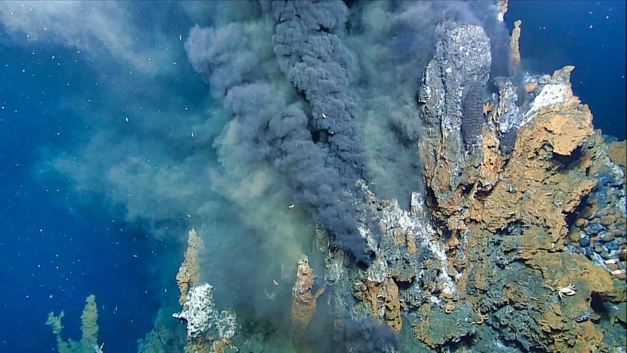 Mineral-laden water emerging from a hydrothermal vent