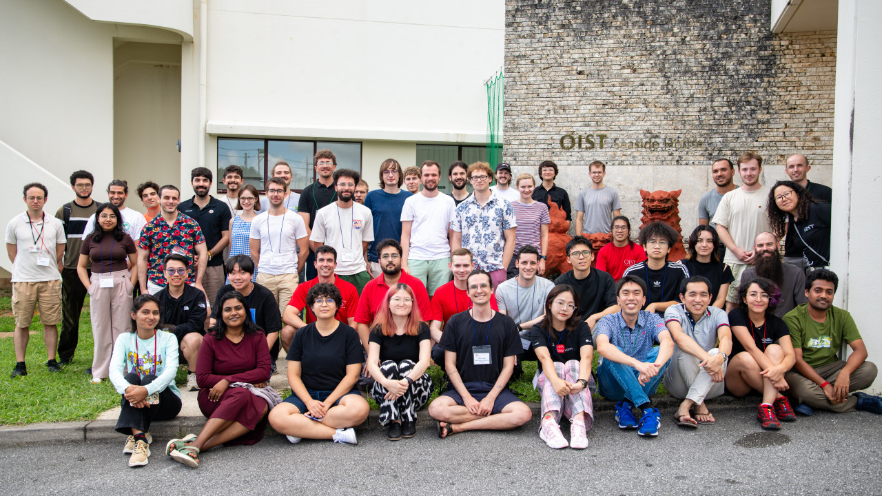 Participants of OSP2025 in front of the summer school venue – OIST Seaside House. 