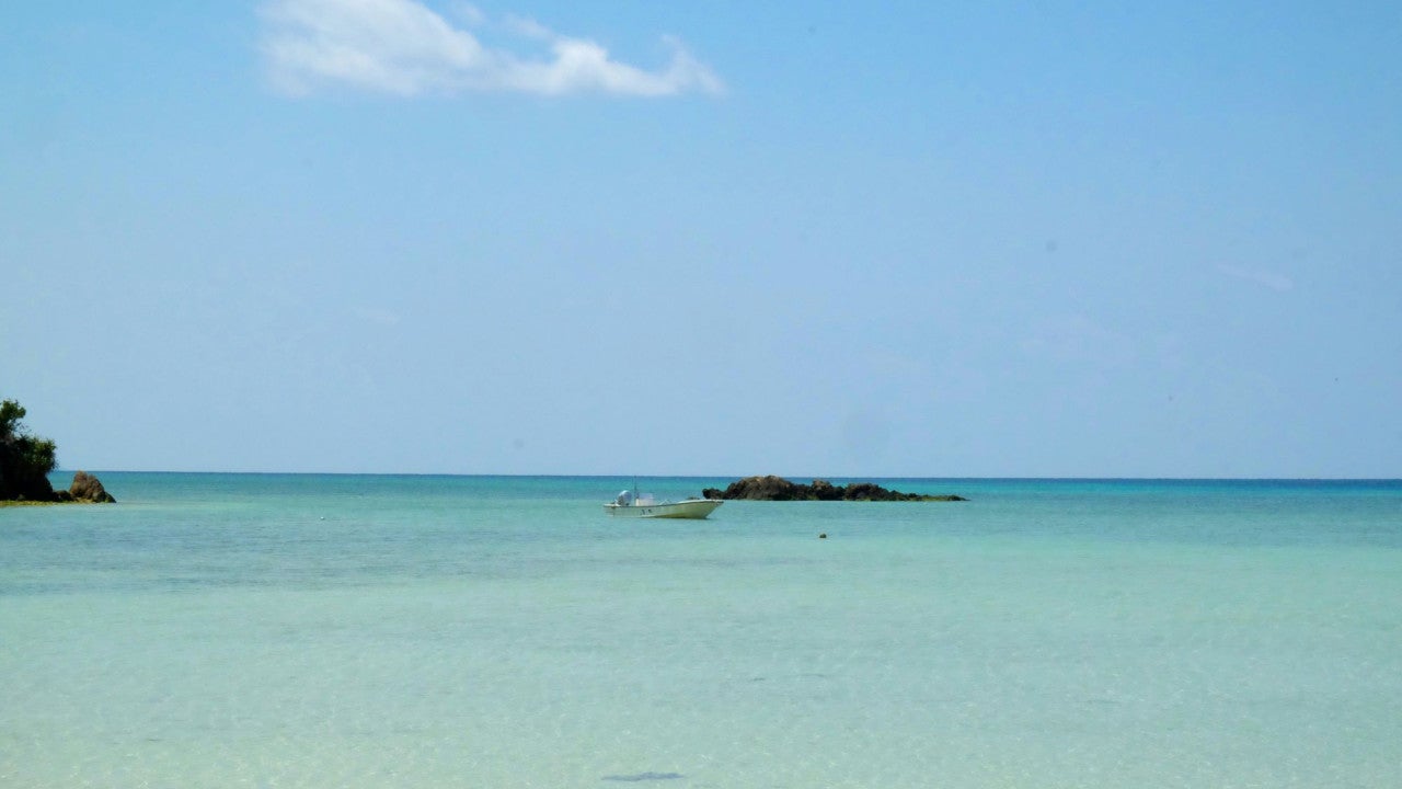 Fishing boat in shallow tropical waters