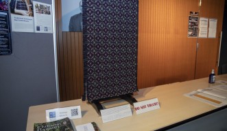 A traditional Okinawan textile, Chibana hanaori, which showed the design used on the workshop poster, was kindly lent for display outside the venue by the Chibana-Hanaori Business Cooperative. 