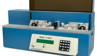table-top machine to mount pipettes to pull capillaries with control panel on front
