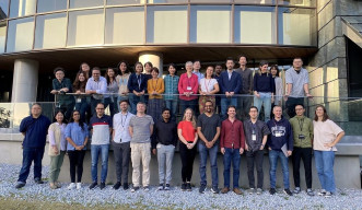 A group of people in front of a building