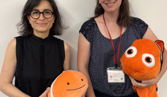 two ladies with Nemo doll
