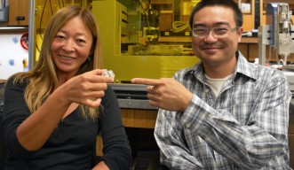 Prof Amy Shen (left), and PhD student Hsieh-Fu Tsai (right) showing the insert.