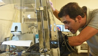 Mr. Zafer Hawash setting up the hanging mercury drop electrode system for conductivity measurement