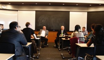 Ryōji Noyori, Nobel Laureate and President of RIKEN, speaks with OIST graduate students after his lecture