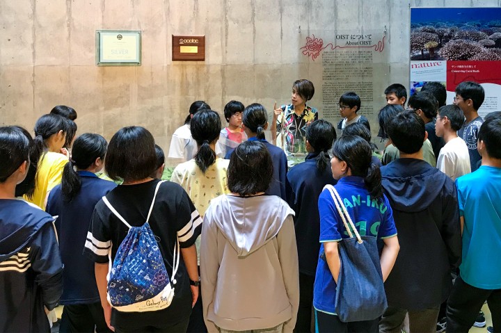 children gathered in a hall