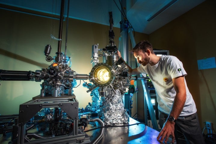 Researcher using device