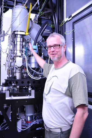 Lars Goran Ofverstedt in front of a machine