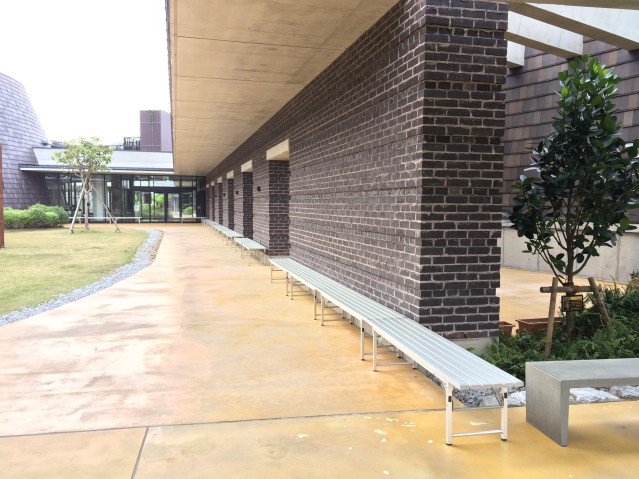 Conference Center Walkway: Benches for lunches during international conferences (benches rented separately from external rental vendor; not available at venue) 