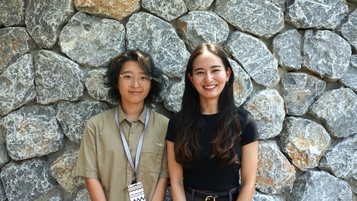 two students smiling