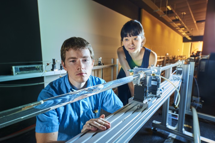 two researchers observing