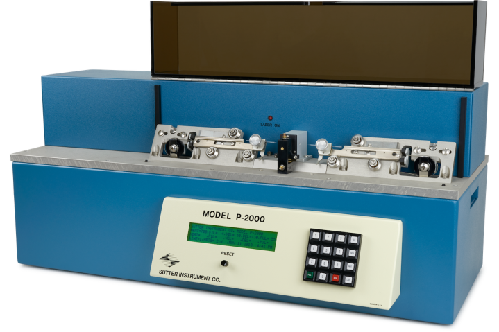 table-top machine to mount pipettes to pull capillaries with control panel on front