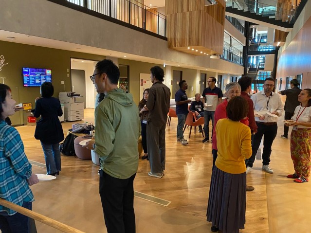 People gathering in a hall