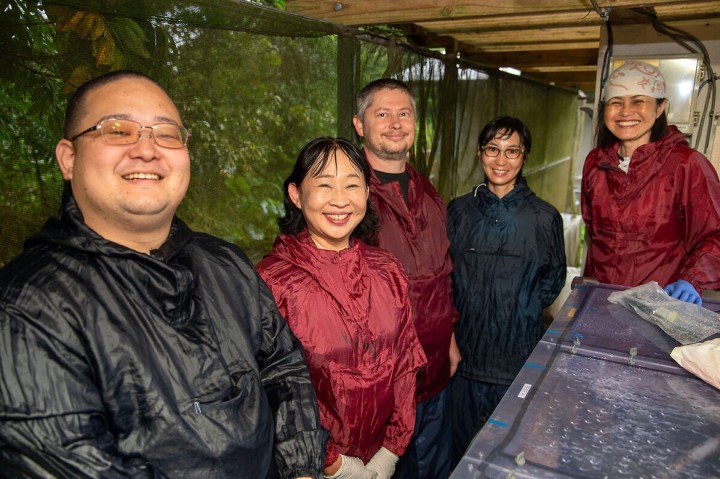 A group of people smiling at the camera
