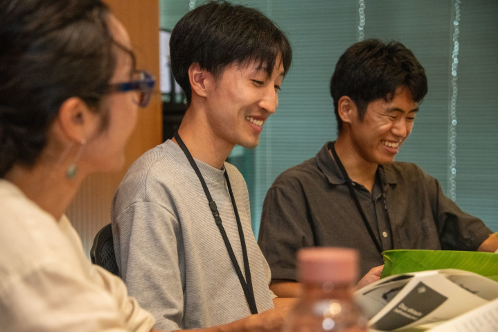 Students from Keio engage in an Uchinaaguchi lesson during a hands-on cultural workshop. 