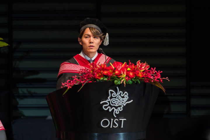 Yuki Tara, delivering the valedictory address at OIST graduation ceremony 2026