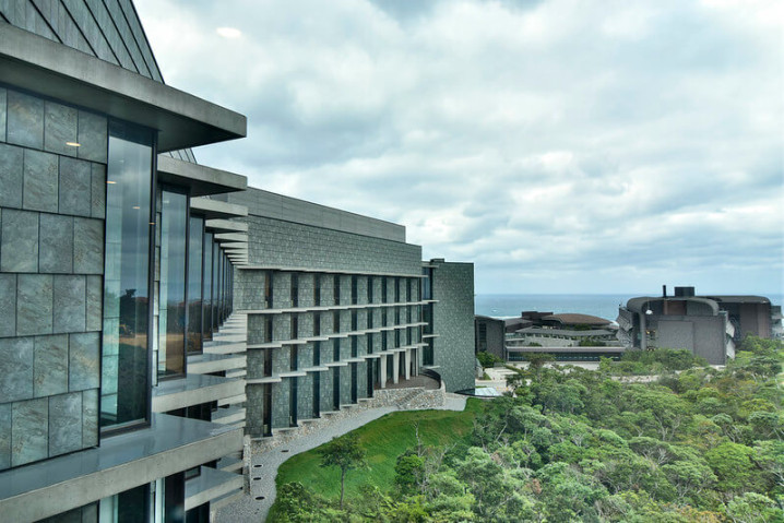 Buildings in a green landscape