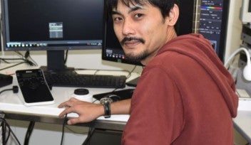 Man sitting in front of a computer