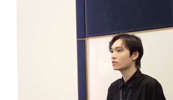 A PhD student giving a lecture