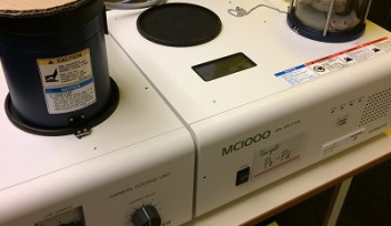 sputtering device from Hitachi, tabletop with timer controls and small sample chamber