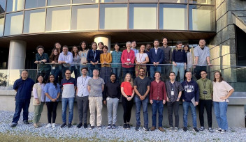 A group of people in front of a building