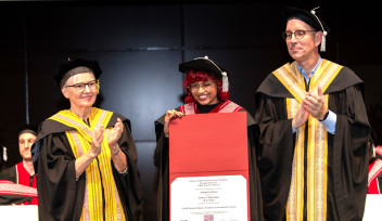 A graduate student received her certificate