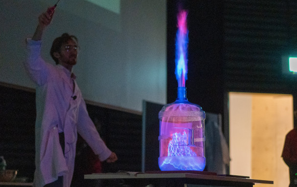 Jack igniting a bottle filled with ethanol vapor, creating a fire spout.