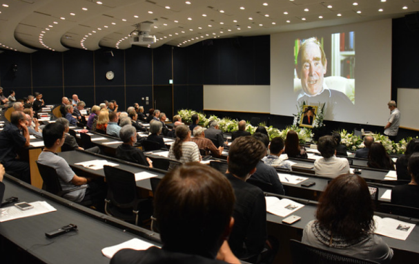 People seated in a lecture hall