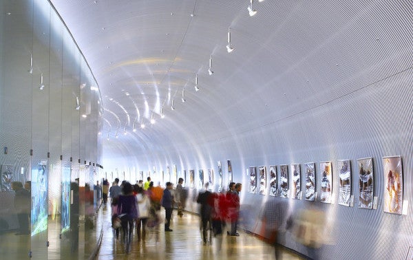 tunnel with displays and people